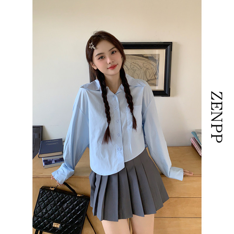 热销蓝色衬衫女秋装2024新款风衣内搭打底衫叠穿上衣百褶裙搭配的