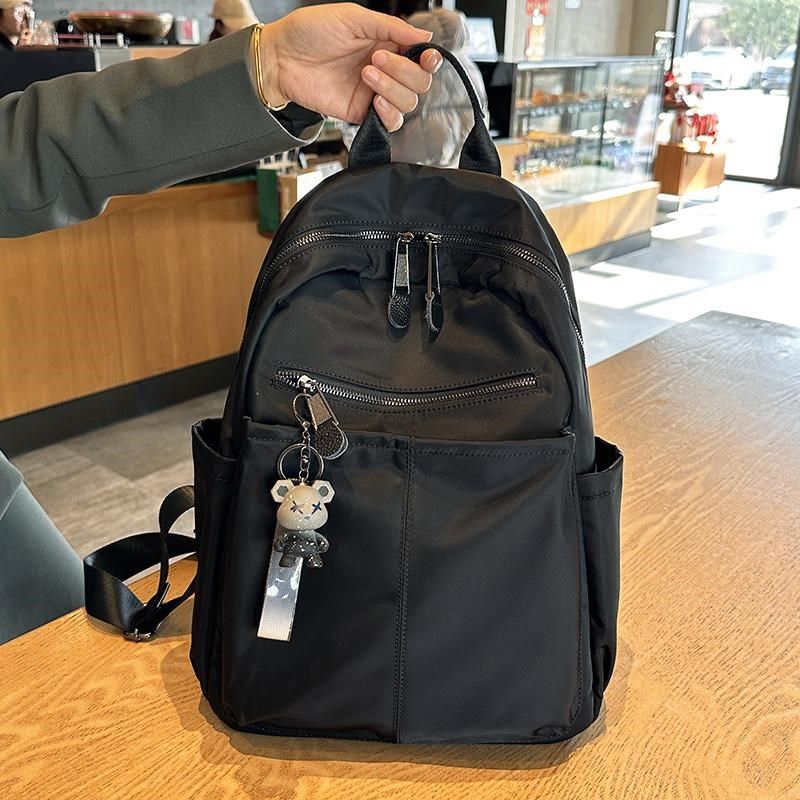 牛津布双肩包女2025新款时尚大容量书包女士休闲帆布背包旅游轻便