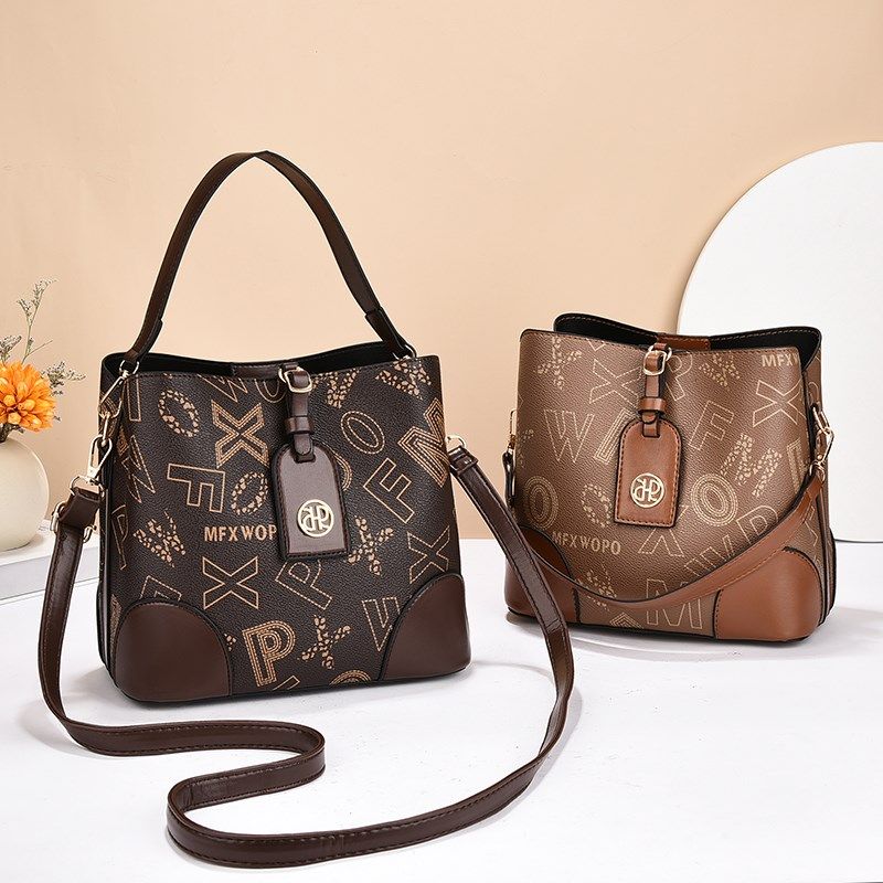 夏季水桶包女斜挎包2023新款时尚洋气小众手提小包女士软皮单肩包,箱包皮具/热销女包/男包,水桶包,淘宝优惠券,粉丝福利购,淘宝优惠卷