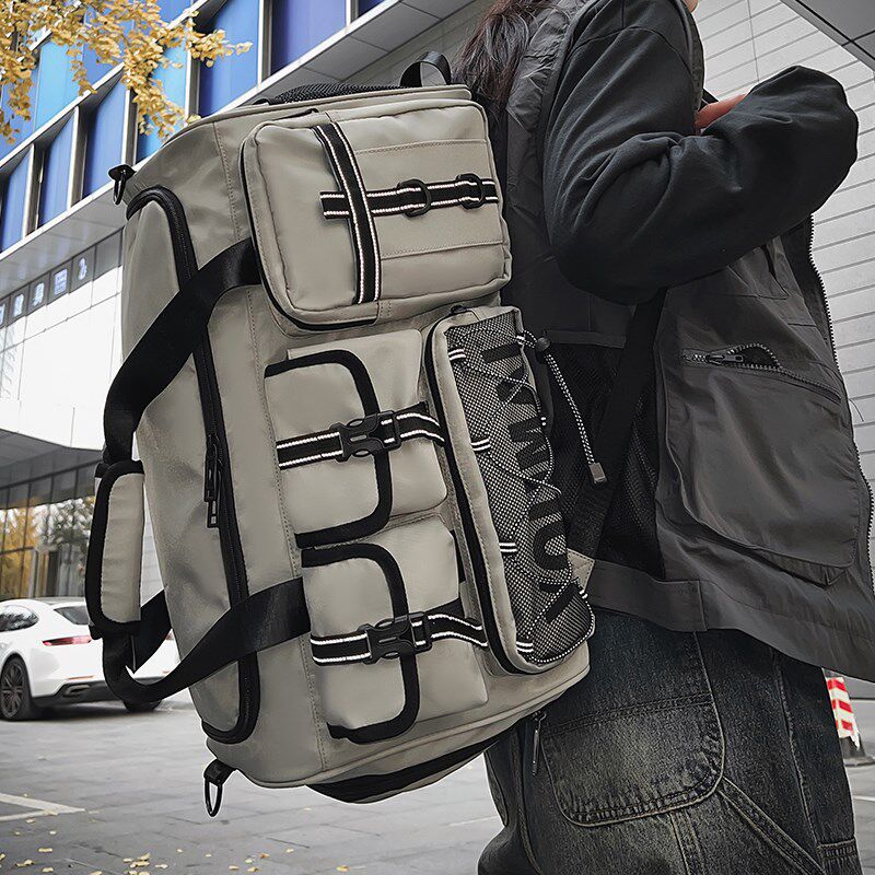 男士休闲旅游包短途外出旅行包轻便双肩包大容量黑包防水行李包男