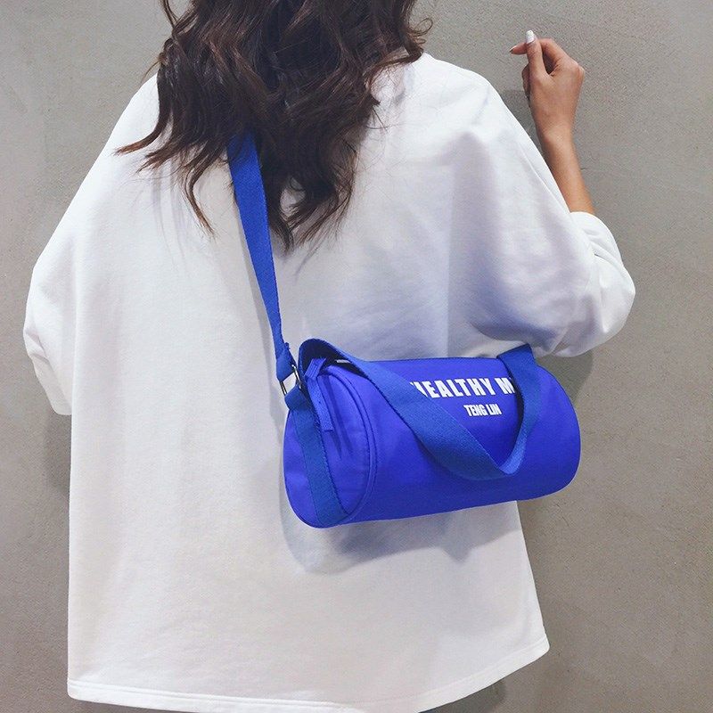 红色帆布包女2024新款运动圆筒包手提健身小包休闲旅游骑行斜挎包,箱包皮具/热销女包/男包,通用款女包,淘宝优惠券,粉丝福利购,淘宝优惠卷