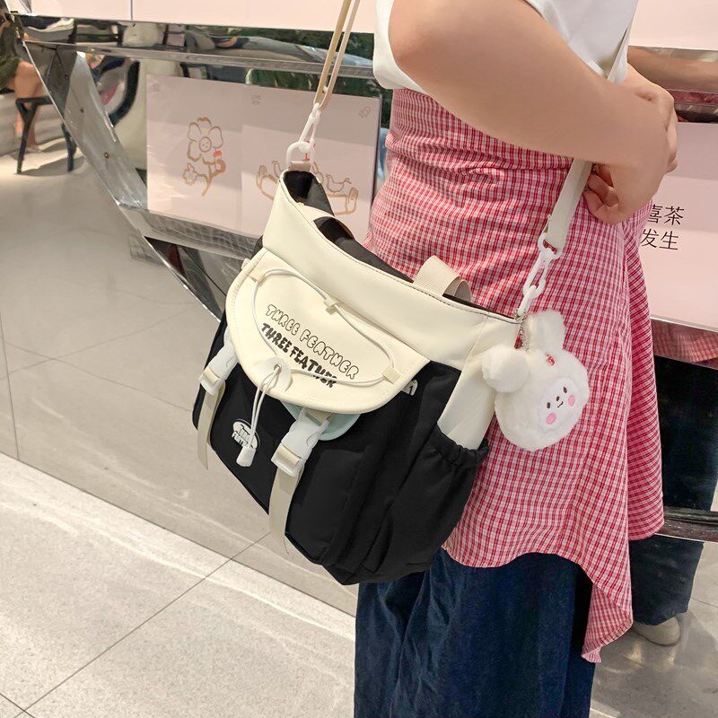 小学生单肩包女孩补习班帆布背包手提拎书袋补课包儿童可爱斜挎包