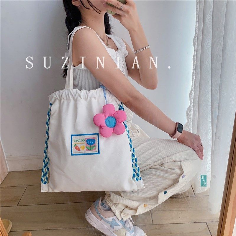 小众设计可爱束口抽绳帆布单肩包女大学生补习大容量手提双肩书包,箱包皮具/热销女包/男包,时尚帆布包,淘宝优惠券,粉丝福利购,淘宝优惠卷