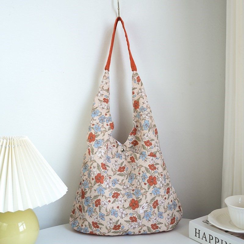 港风碎花托特帆布包包女款学生小众设计斜挎单肩大容量购物环保袋
