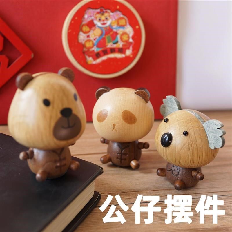 车载摇头公仔汽车香薰摆件卡通动物弹簧玩具木质工艺品玩偶