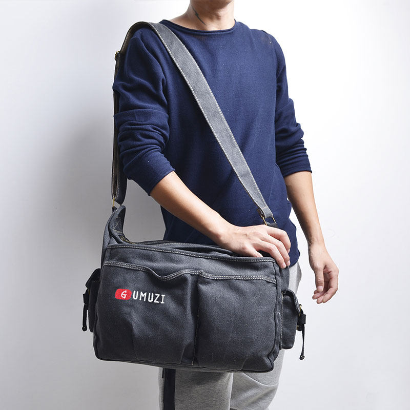 新款男士单肩斜挎包大容量帆布包结实耐磨工具包休闲旅行包多层潮