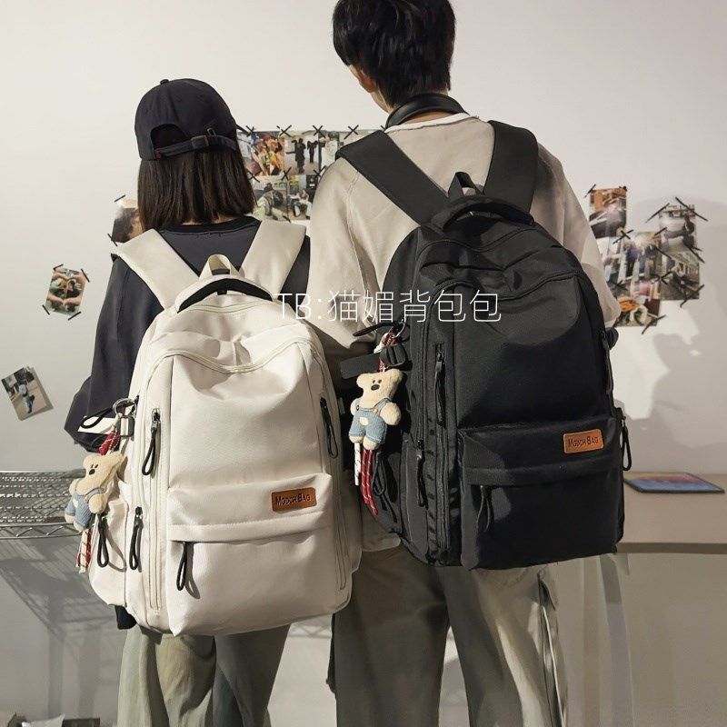 高中生书包2024新款男生潮流黑色双肩包女旅游轻便大容量电脑背包