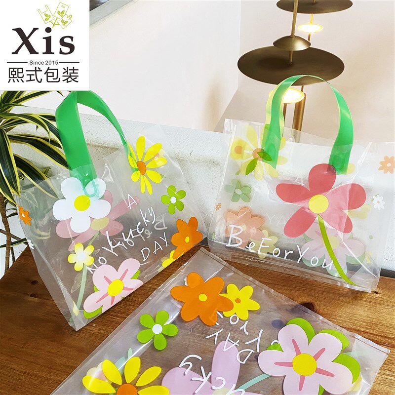 小众高货ins泫雅花朵透明塑料手提袋韩版童装服装购物袋饰品面膜