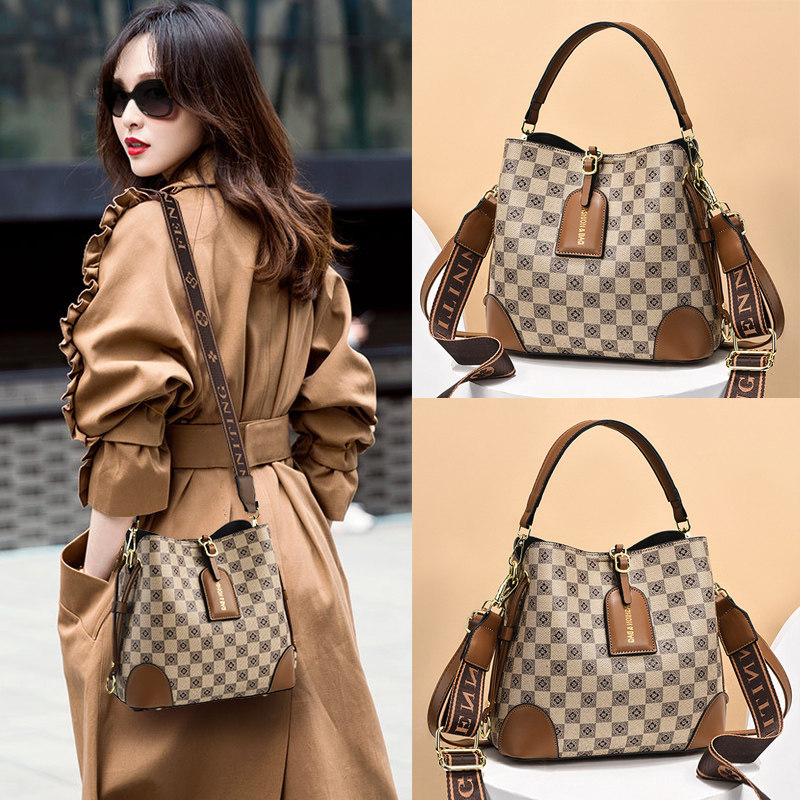 高级感水桶包女包j2022新款秋冬斜挎包大容量单肩包大气手提包轻,箱包皮具/热销女包/男包,水桶包,淘宝优惠券,粉丝福利购,淘宝优惠卷