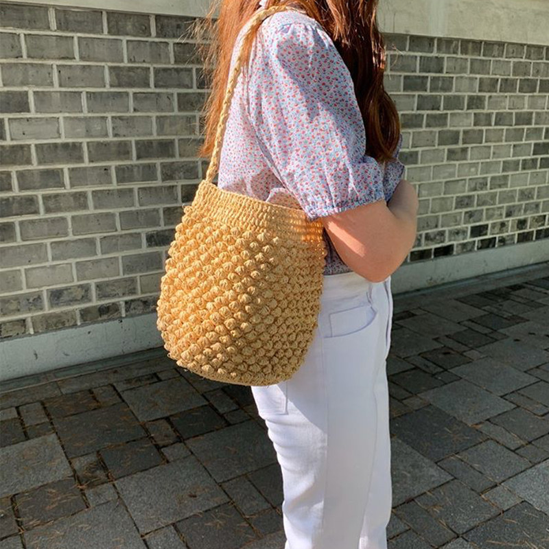 法式编织包女夏手工手织包包手提单肩草编藤编草包海边小众水桶包