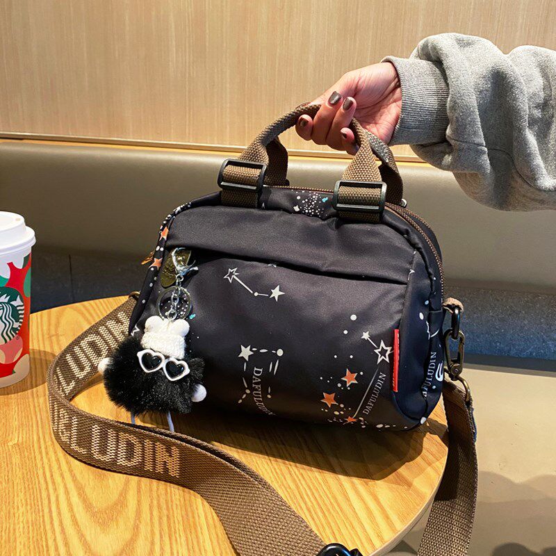 百搭女包2025双拉链大容量斜挎手提包秋冬时尚星空印花单肩布袋子