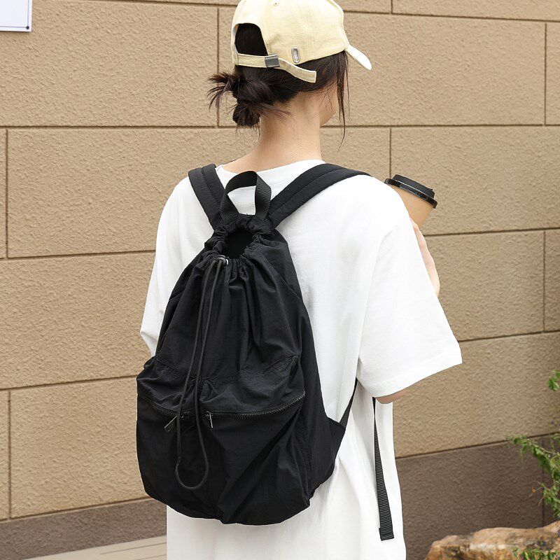 小众抽绳双肩包女韩版束口尼龙帆布包大容量学生书包轻便旅行背包