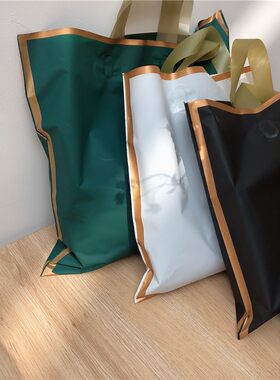 高档新款磨砂金边加厚服装袋子塑料袋女装袋手提购物袋可定制logo