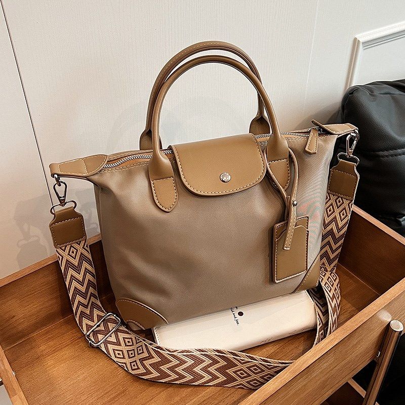 帆布大包包女包2024新款高级感大容量通勤斜挎包学生单肩手提包