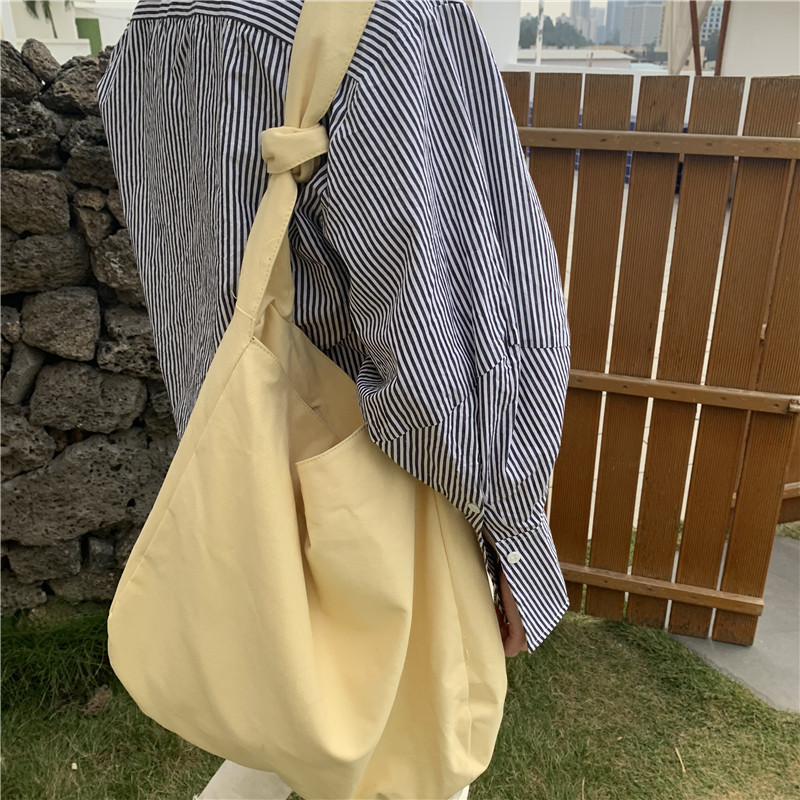 打结纯色简约帆布包小p清新慵懒风大容量学生百搭文艺斜跨单肩女