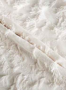 罗衣气质杏色提花半身裙女2025春季新款时尚流苏高腰大摆Y裙09035