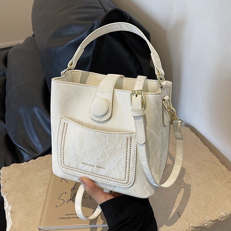 高级感迷你包包女2025新款夏季小众设计女士单肩斜挎包手提水桶包,箱包皮具/热销女包/男包,水桶包,淘宝优惠券,粉丝福利购,淘宝优惠卷