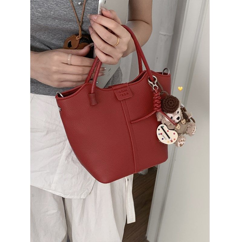 手提菜篮子包包女2024新款潮时尚韩国水桶包多功能手拎红色斜挎包,箱包皮具/热销女包/男包,水桶包,淘宝优惠券,粉丝福利购,淘宝优惠卷