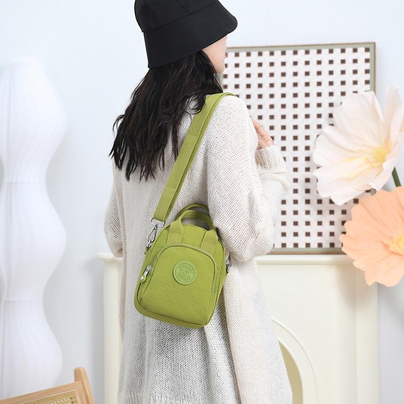 手提帆布斜挎包女秋冬新款多层单肩女士上班遛弯小布包韩版手机包