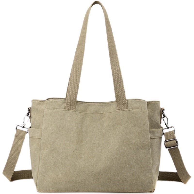 大容量单肩斜挎包女帆布包多隔层上班通勤手提包休闲口袋斜背包潮,箱包皮具/热销女包/男包,通用款女包,淘宝优惠券,粉丝福利购,淘宝优惠卷