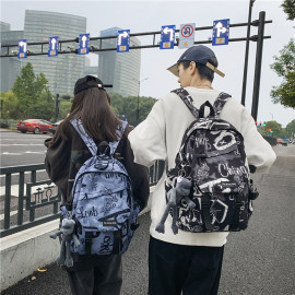 原宿双肩包ins潮酷大容量涂鸦背包女士休闲大学生书包男初中生