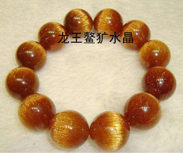 龙王鳌犷水晶天然铜发晶顺发猫眼手链  18mm  112克
