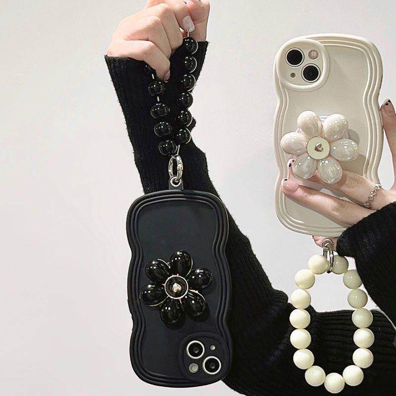 潮流简约花朵支架iphone16手机壳