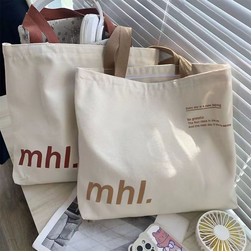 UR包包女士新款帆布包女小众字母印花肩包大容量通勤托特包