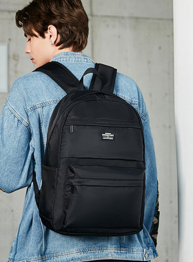 囯潮品牌黑色简约双肩包防水旅行轻便背包运动休闲大学生书包男女
