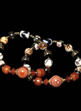 钙化老玛瑙虎牙天珠天然柿红缟玛瑙天眼珠琉璃牛骨多天珠手链女