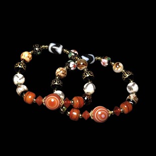 钙化老玛瑙虎牙天珠天然柿红缟玛瑙天眼珠琉璃牛骨多天珠手链女
