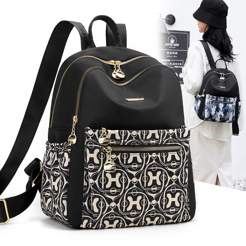 简约休闲女士双肩包2025新款复古印花通勤上课书包大容量旅行背包