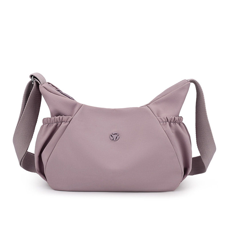 2026双侧水杯伞位纯色饺子形女式外出单肩斜挎IPADMINI伞逛街背包