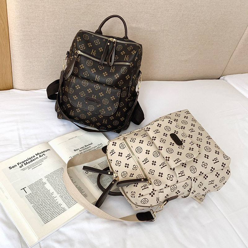 多功能双肩背包女2024新款百搭旅行大容量书包休闲女士PU软皮包包