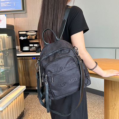 2025新款休闲轻便防水大容量旅游背包两用时尚印花牛津布双肩包女