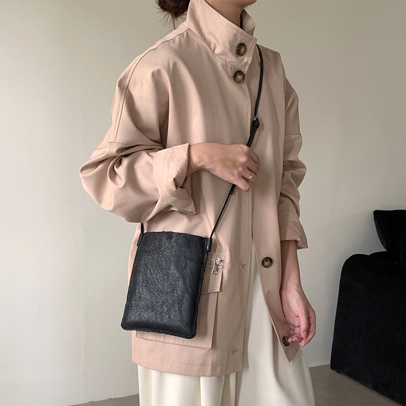 翻面两用毛绒水桶包2025新款毛毛包轻便百搭手机包女真皮斜挎包包