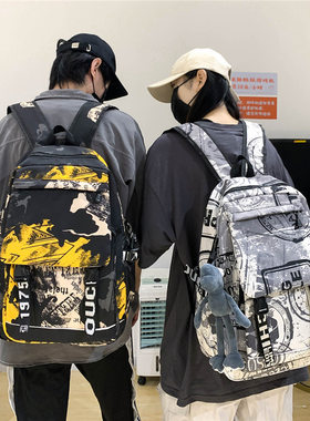 新款大容量男女双肩包涂鸦印花初中大学生书包户外旅行电脑背包