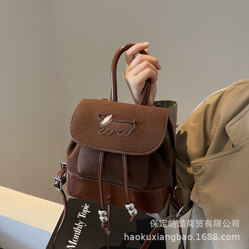 墨羽复古学院风双肩包包女25新款韩风撞色小众手提水桶包肩背包潮
