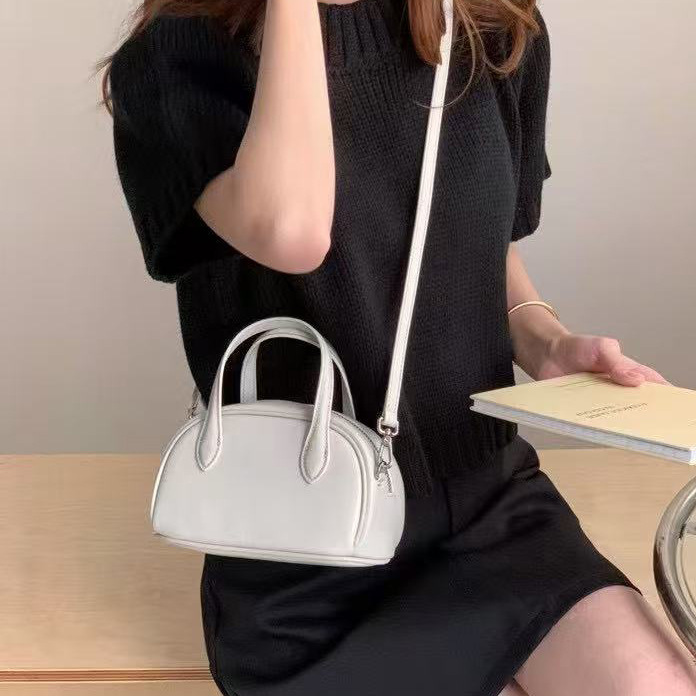 真皮肩斜挎波士顿包包2025新款韩版小众复古手提真牛皮保龄球包