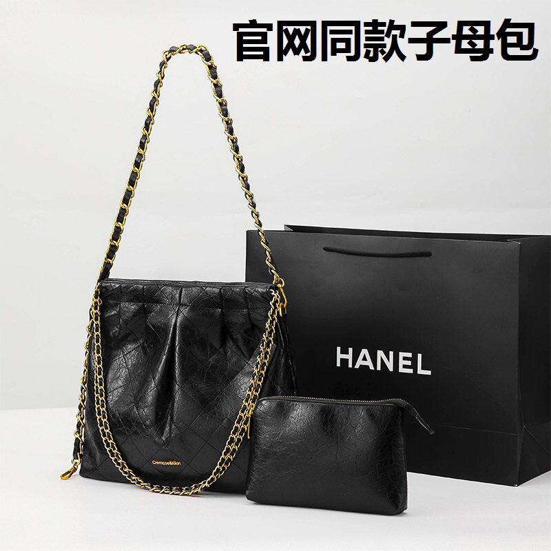 轻奢大容量肩子母链条托特包油蜡皮垃圾袋包菱格跨境流浪包女包