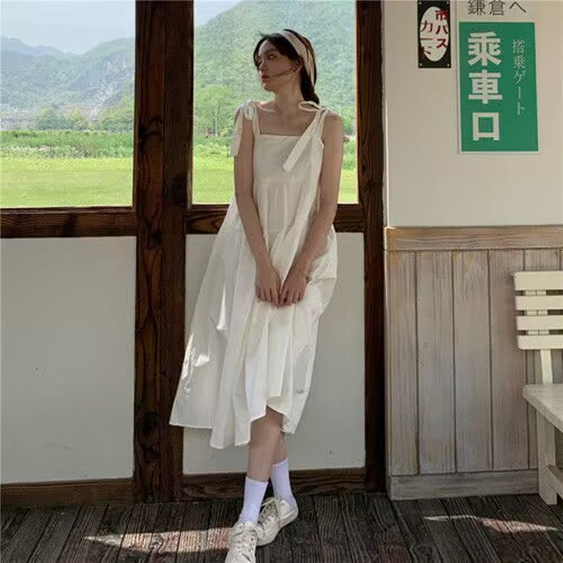 白色吊带裙夏季2023新款小清新蝴蝶结系带中长款初恋裙子连衣裙女