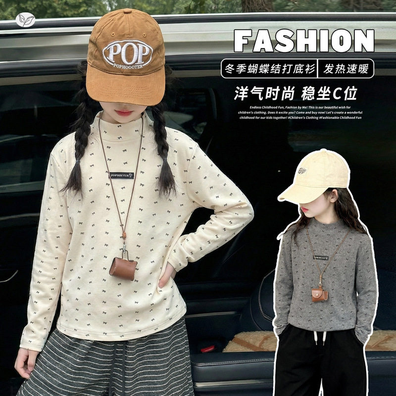 女童打底衫2025年秋冬新款满印蝴蝶结长袖T恤中大童休闲内搭上衣，童装T恤，祺儿童装