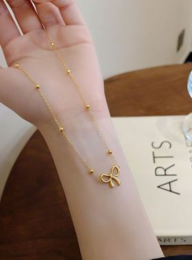 新款钛钢小众设计跨境不掉色可爱镂空蝴蝶结吊坠项链女锁骨链饰品