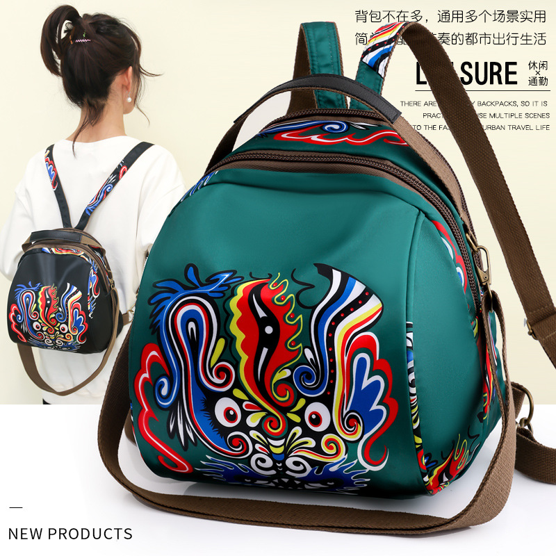 双肩包女时尚新款国潮风印花大容量旅行包百搭时尚潮流双肩小圆包