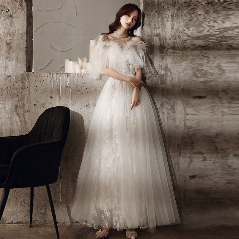 白色羽毛晚礼服裙女法式级感轻奢小众端生日婚纱成人一字肩春款