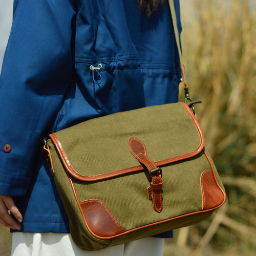 品质复古邮差包街拍潮流女帅气通勤大包帆布配真皮肩包