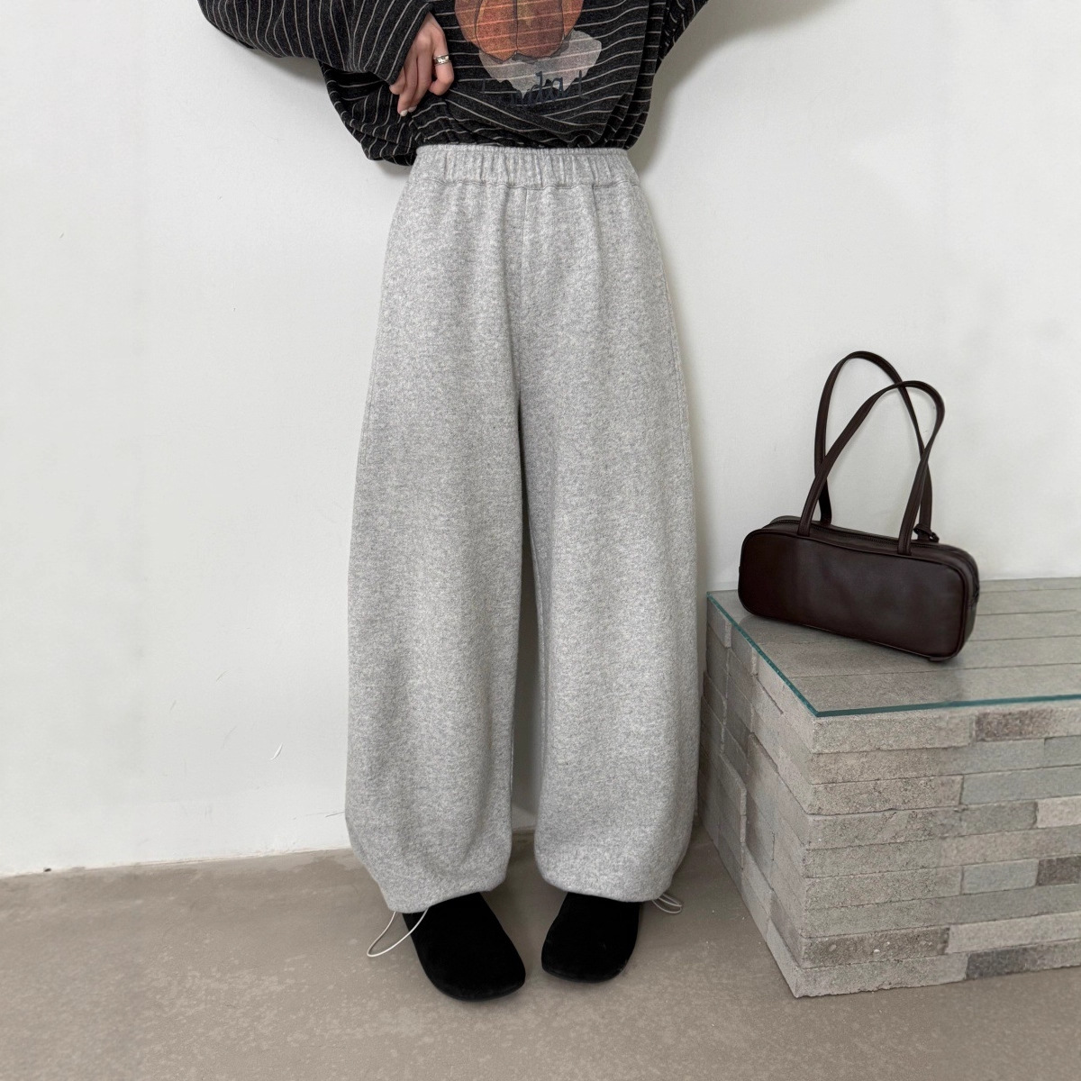 EMONI冬季慵懒风显瘦阔腿收脚羊毛裤女2025韩版小个子休闲裤14546