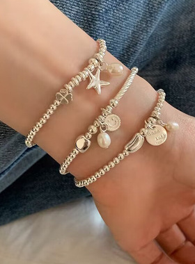 S925银手链串珠女珍珠海星笑脸吊坠简约轻奢小众精致送闺蜜手饰品
