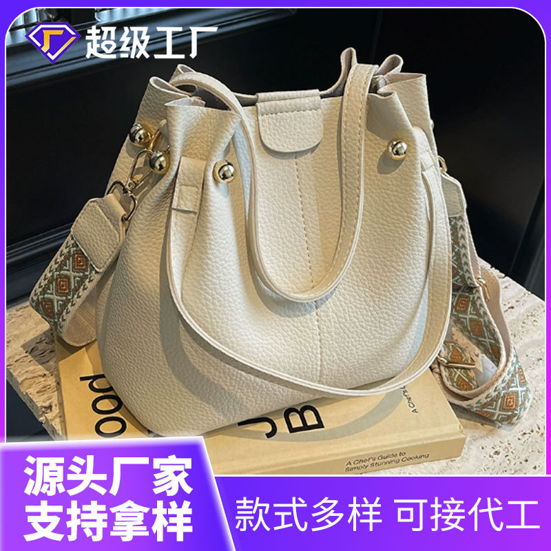 跨境包包女级感百搭水桶包夏2025新款宽带肩斜挎包女士手提包