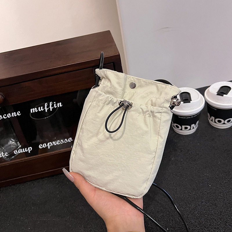 外贸出口单极简风手机包女日韩轻薄抽绳帆布小包迷你肩斜挎零钱包